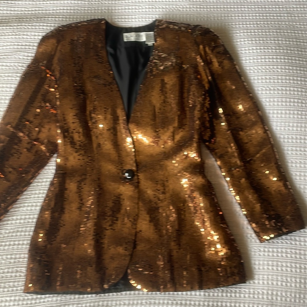 Amazing copper colored full sequin jacket in perfect condition. Worn once only.